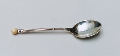 null 
12 Silver mocha spoons with ivory ball design, 20th century 




Gross weight...