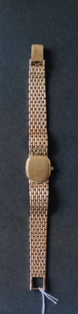 null BAUME & MERCIER

Lady's wristwatch in yellow gold 750°/°°°, quartz movement...