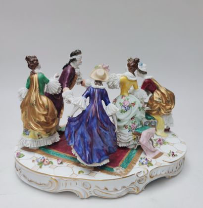 null GROUP in polychrome enamelled porcelain representing a meeting of four young...