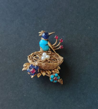 Yellow gold brooch 750°/°° and various colored...