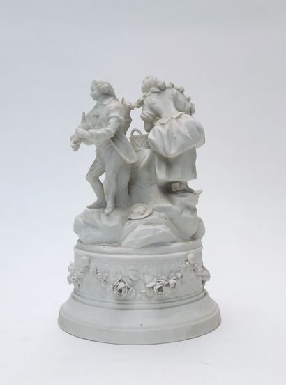 null 
Bisque GROUP representing two gallants and a young woman, a basket containing...
