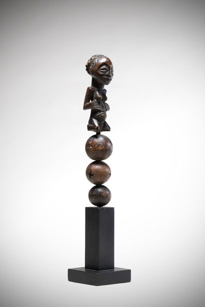 null LUBA (Congo DRC)

Bruiteur composed of three hollow seeds surmounted by a kneeling...