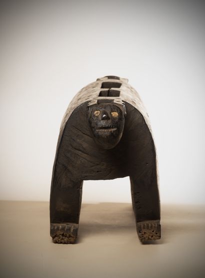 null BAMILEKE (Cameroon)

Slotted drum representing a panther or a leopard with two...