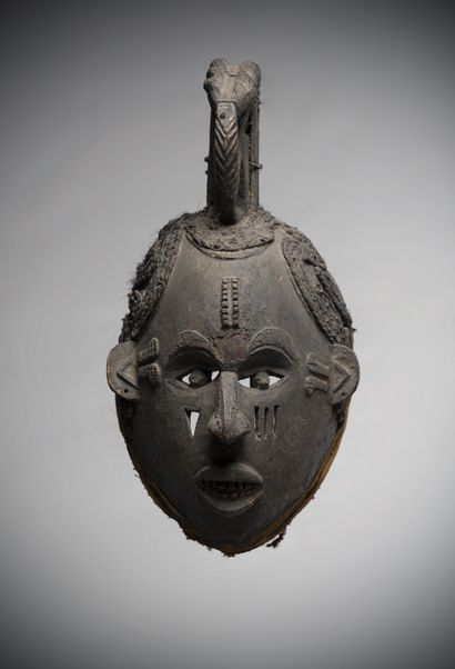 null IBO (Nigeria)

Helmet mask with openwork eyes, the scarification marks on the...