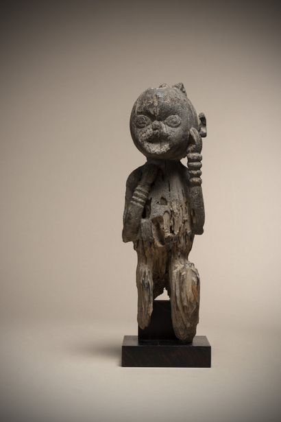 null M'BEMBE (Nigeria)

Very old statue in a seated position, one arm joining the...