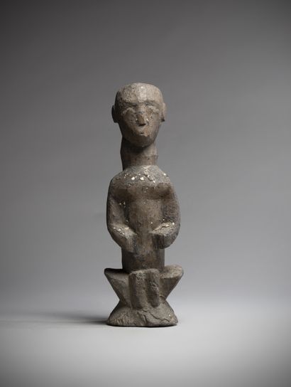 null BIDJOGO (Guinea Bissau)

Iran" statue in heavy wood, sitting on a trapezoidal...