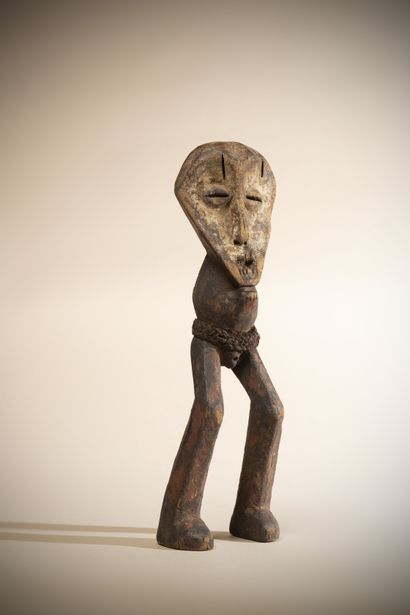 LEGA (Congo DRC) 
Light wooden statue with...