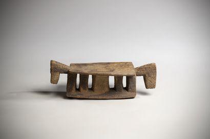 null DOGON (Mali)

Wooden neck rest representing a horse with two heads. Beautiful...
