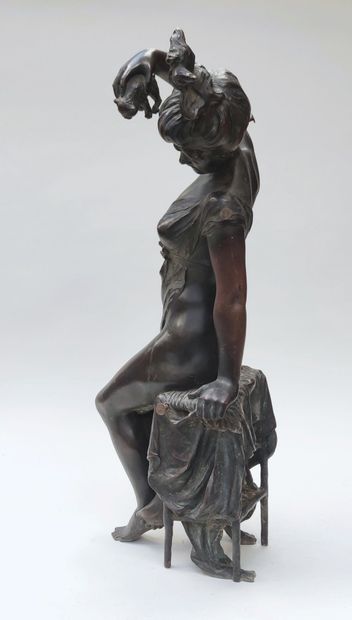 null 20th century french school 

Young woman with a kitten 

Proof in bronze, brown...