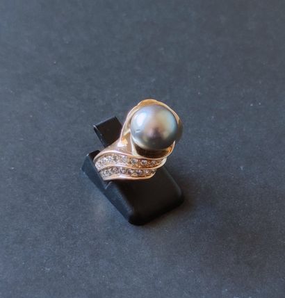 
RING IN YELLOW GOLD 750°/00 set with a pearl...