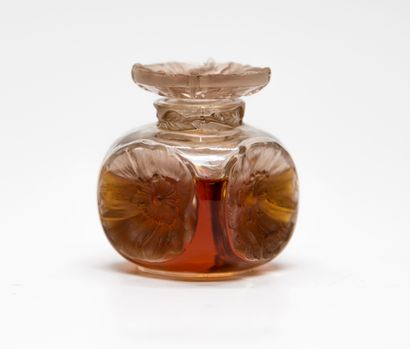 null Clamy - "Sauvageonne" - (1913)

Rare flacon en verre incolore pressé moulé patiné...