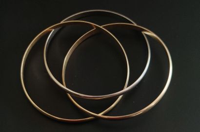 null THREE BRACELETS IN YELLOW, WHITE AND PINK GOLD 

weight : 46.7g