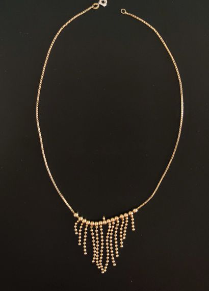 NECKLACE IN YELLOW GOLD 750°/00 with a central...