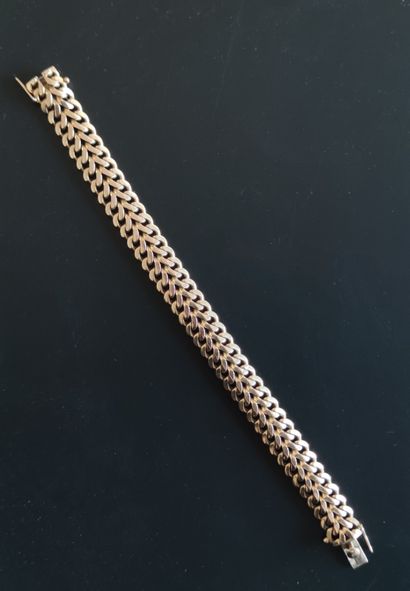  BRACELET in yellow gold 750°/00 with plaited...