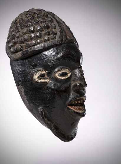 null Bamileke (Cameroon) Chieftaincy mask representing the "Fon" wearing the traditional...