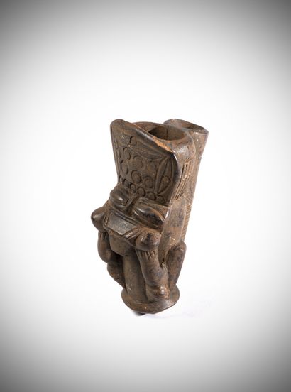 null Bamiléké (Cameroon) Pipe bowl in terra cotta representing a character with a...