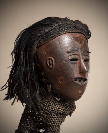 null Lwazi / Tchokwe (Angola / Zambia) "Pwo" mask with red ochre patina, bearing...