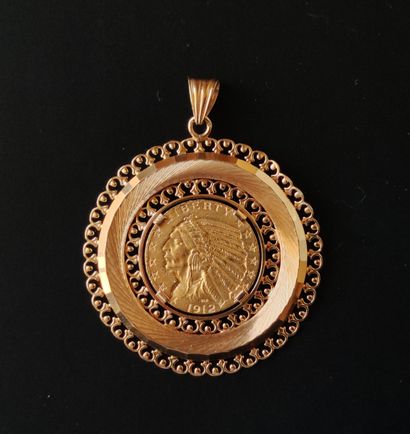 null PENDANT in yellow gold 750 °/°° decorated with a gold coin of five US dollars.

Weight...