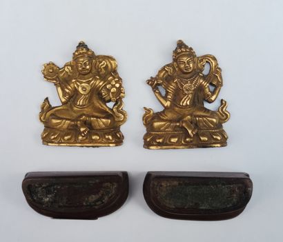 null Lot of eleven representations of Buddha and deities in gilded and patinated...