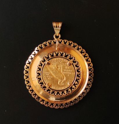 null PENDANT in yellow gold 750 °/°° decorated with a gold coin of five US dollars.

Weight...