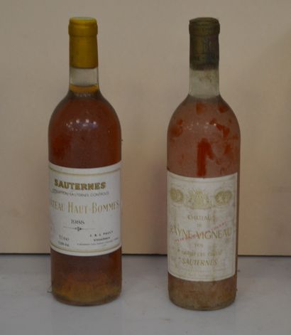 null 2 bouteilles : 1 CHÂTEAU RAYNE VIGNEAU 1970 (BG) et 1 CHÂTEAU HAUT-BOMMES 1988...