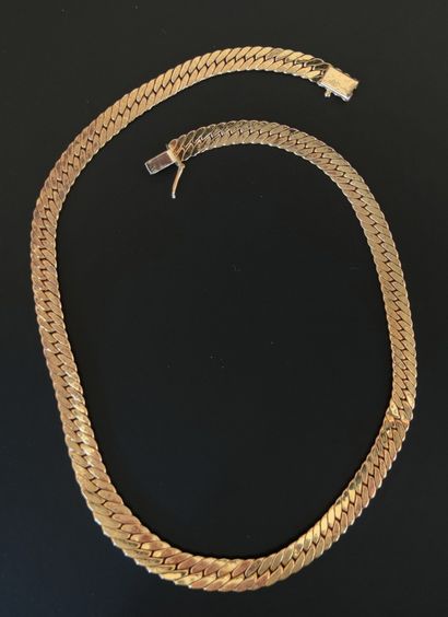 null Flexible necklace in yellow gold 750°/00 with snake chain 

Weight : 24.6 g...
