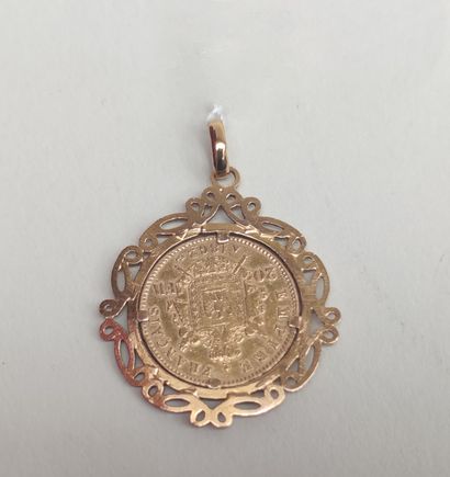 null 
PENDANT in yellow gold 750°/00 decorated with a 20 francs gold coin 




Weight...