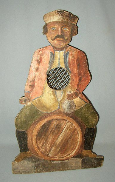 null Original passe boules en bois avec filet et support représentant un Turc assis...