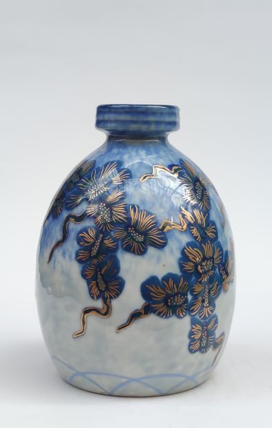 null 
Charles THARAUD - LIMOGES
Porcelain VASE of pansu shape with neck choked with...