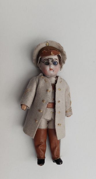 null 
Miniature with head in cookie cast with glasses Dressed in military with its...
