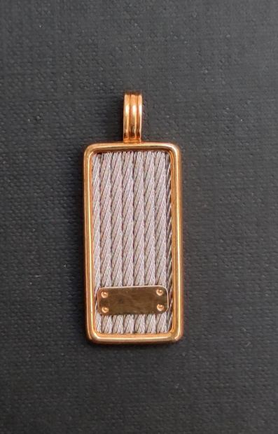 null 
FRED

Force 10 rectangular pendant in yellow gold 750/1000 and steel signed...