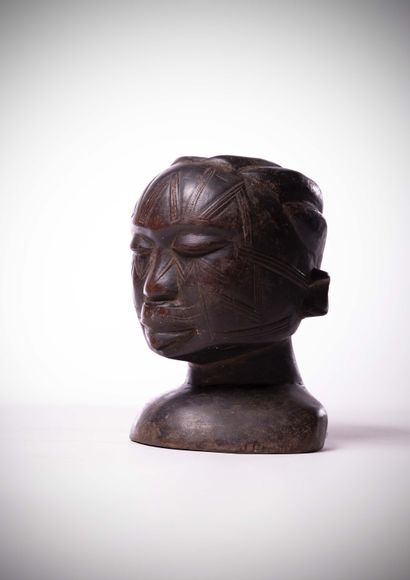 null Makonde

(Mozambique / Tanzania) Altar head representing a young woman with...