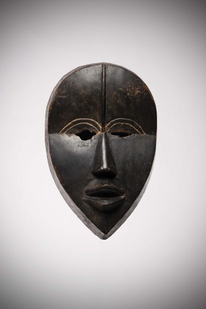 null Dan

(Ivory Coast) Dance mask with slit eyes and protruding forehead.

The right...