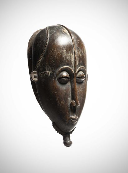 null Yaouré

(Ivory Coast) Elegant male mask in heavy wood with a patina of use.

The...