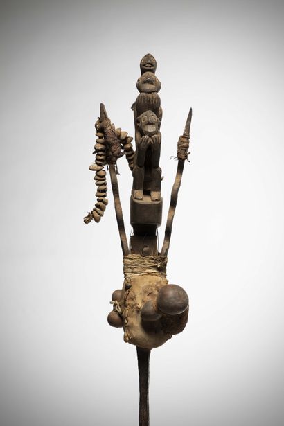 null Fon 

(Benin) Wrought iron composed of two vertical snakes on either side of...