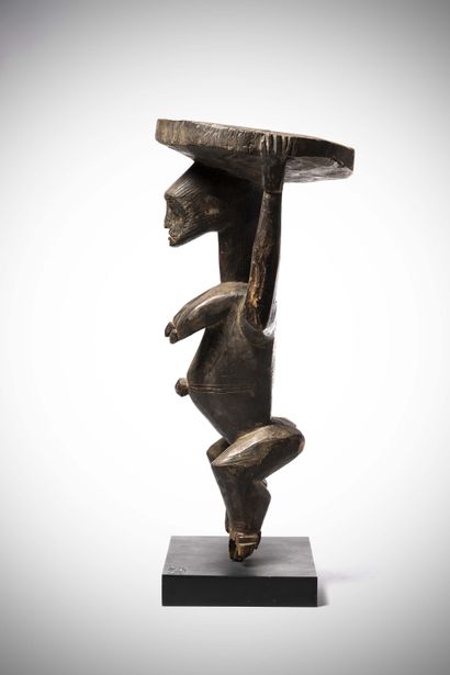 null Afo

( Nigeria ) Caryatid altar seat representing a woman with angular features...