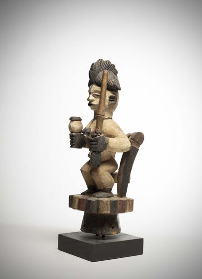 null Ogoni

(Nigeria) Dance crest supporting a seated woman holding a pestle in her...