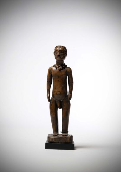 null Tabwa (RDC) Statue masculine à belle patine miel sur un bois dense.

Le visage...