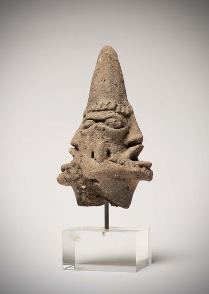 null Koma

(Northern Ghana) Janiform terracotta head with pointed skull, almond-shaped...