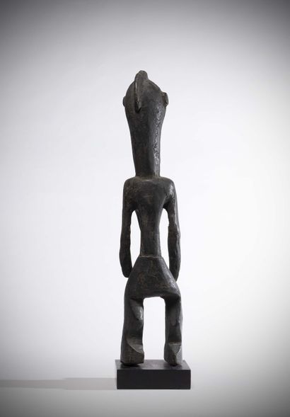 null Angas

(Nigeria) Very old male statue in wood with a black crusty patina.

The...