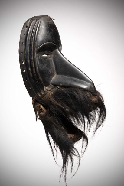 null Dan/Diomande

(Ivory Coast) Anthropo-zoomorphic mask with mobile jaw.

The lower...