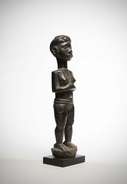 null Tiv

(Nigéria) Statue féminine en bois lourd à patine noire brillante.

Ces...