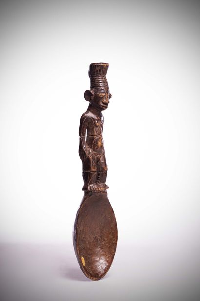 null Mangbétou

(DRC) Ancient ritual spoon whose handle represents a woman wearing...
