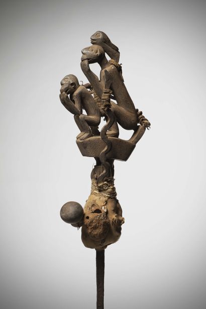 null Fon 

(Benin) Wrought iron composed of two vertical snakes on either side of...