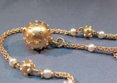 null Petite giletière en or jaune, ornée de sphères et perles. Vers 1900. Poids:...