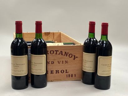 12 bouteilles Château Trotanoy 1981 Pomerol...