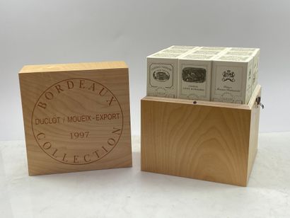 null Caisse Duclot Prestige 1997 1er GCC comprenant : 1 Petrus, 1 Latour, 1 Mouton...