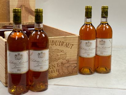 12 bouteilles Château Suduiraut 1982 1er...