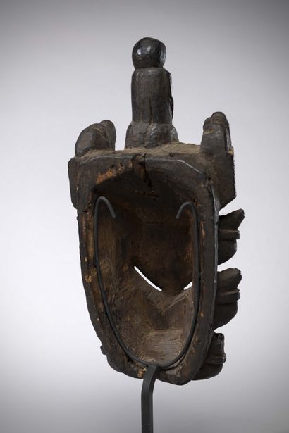 null Bini Nigeria
Mask with thick black patina of smoke, the eyes and the frontal...