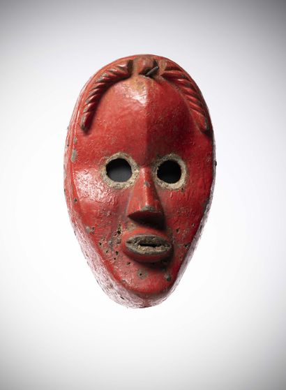 null Dan Ivory Coast
Mask with round eyes coated with red paint. This type of mask...